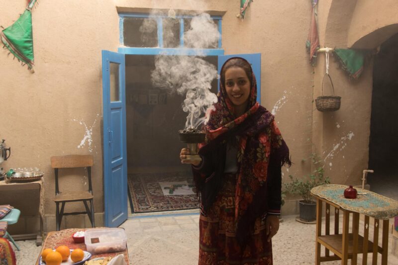 Tina Shohrat at Nartitee Ecolodge, cleansing the rooms with the smoke of sage and other herbs used by Zoroastrians.